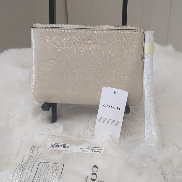 Coach Cream Wristlet with Elegant Minimalist Design - Picture 1 of 5